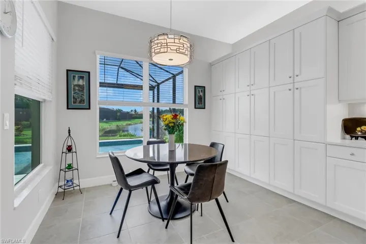 Dining room featuring light tile patterned floors