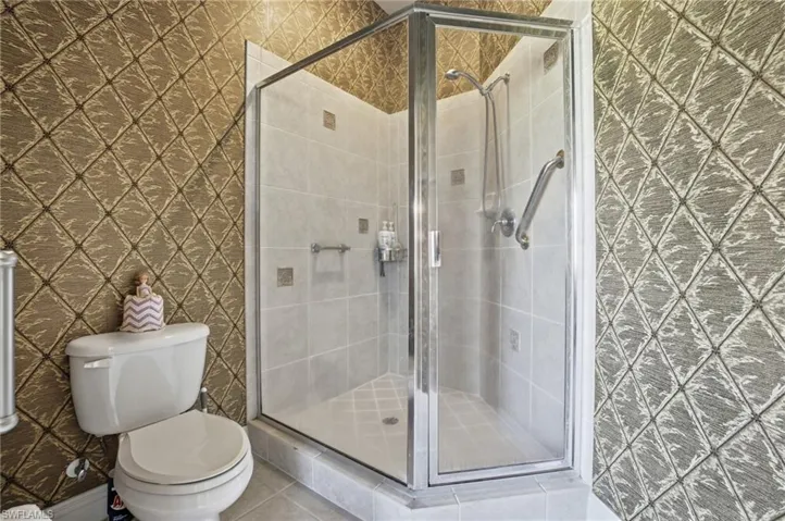 Primary Bath walk in shower and toilet