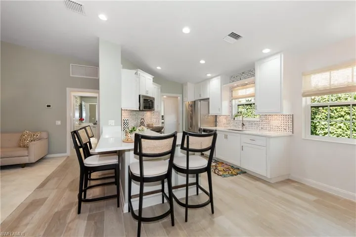 All new countertops, back splash,  appliances , cabinets, sink flooring,  Breakfast bar area.
