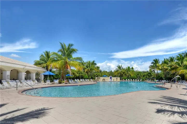 Resort pool with indoor , outdoor restaurant, bagel shop sandwiches