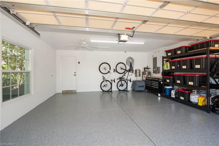 2 car epoxy floors newly painted garage.