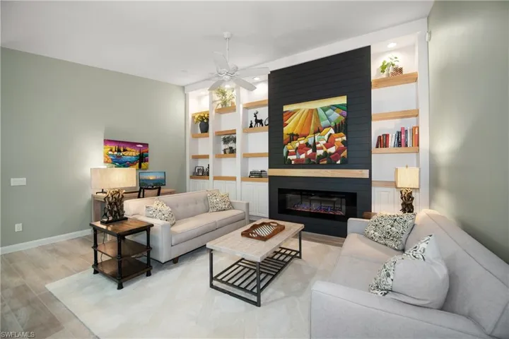 Family room with fire fireplace build inns tile flooring