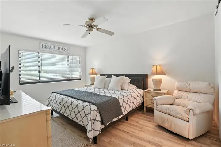 Bedroom featuring light wood-type flooring and ceiling fan