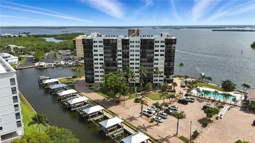 Bird's eye view of apartment complex / building and a large body of water