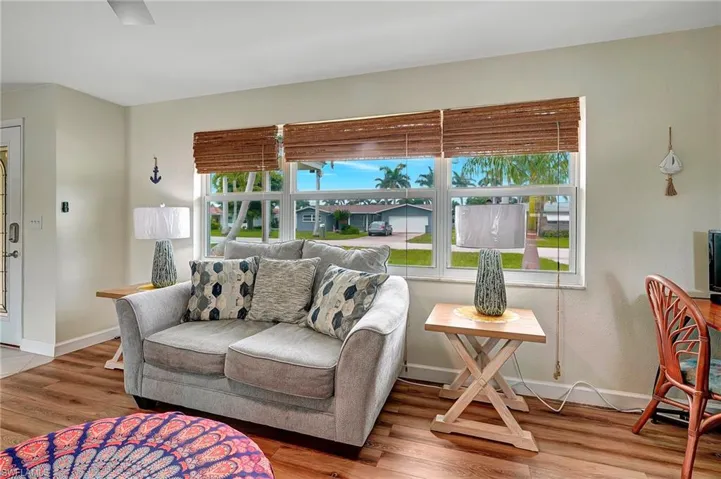 Living room with hardwood / wood-style floors