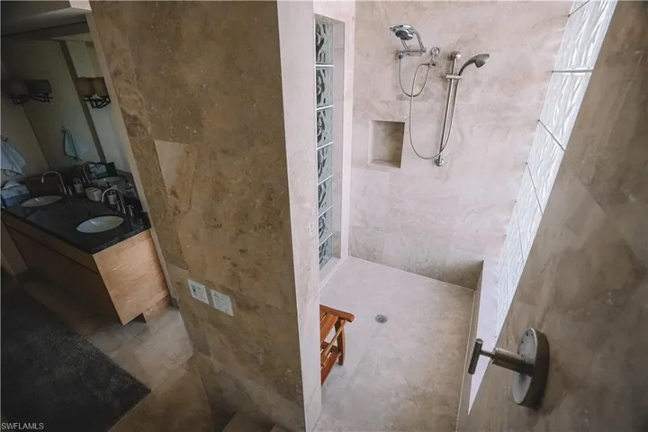 Bathroom with a shower and vanity