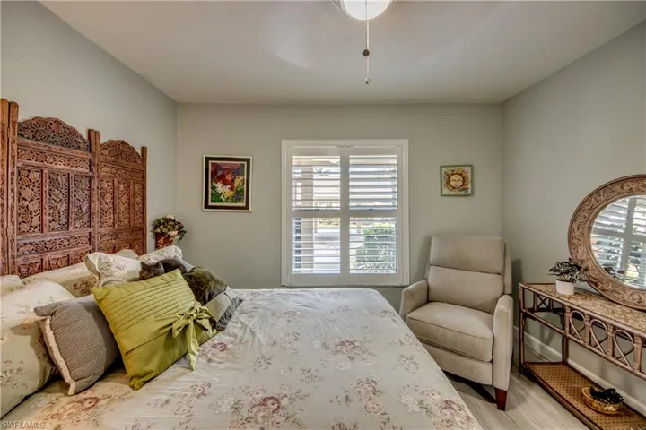 Bedroom with light hardwood / wood-style flooring
