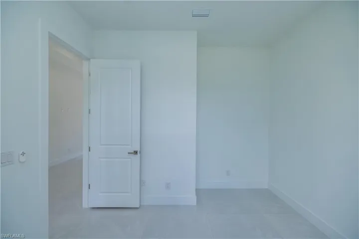View of tiled empty room