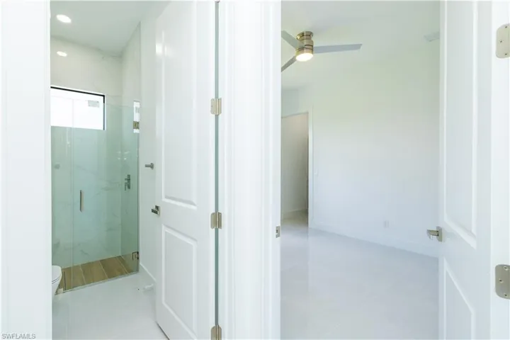 Hallway with tile floors