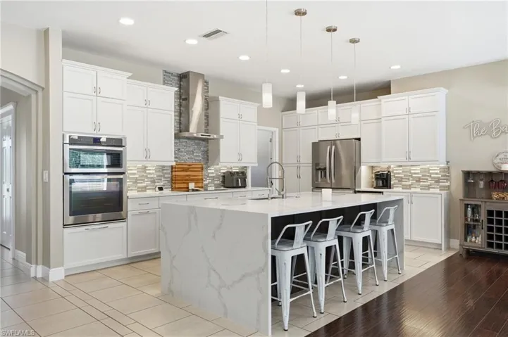 Beautiful waterfall counters with storage in the island