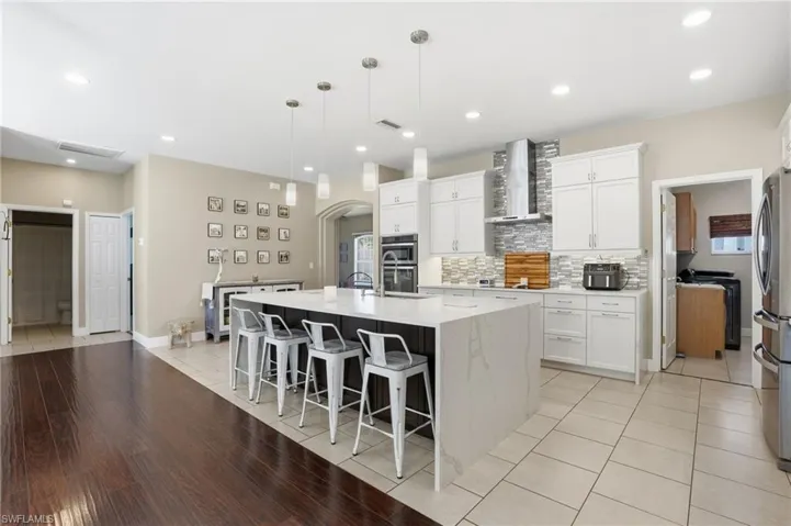Beautiful tile backsplash and plenty of storage.