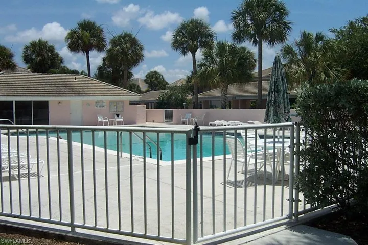 Community pool featuring a patio area