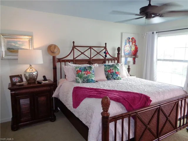 Bedroom with carpet flooring and ceiling fan