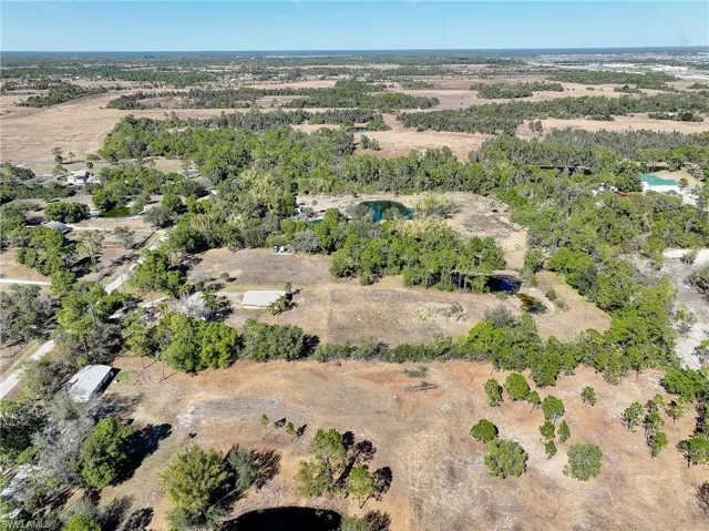 Aerial overview of property's location featuring rural landscape
