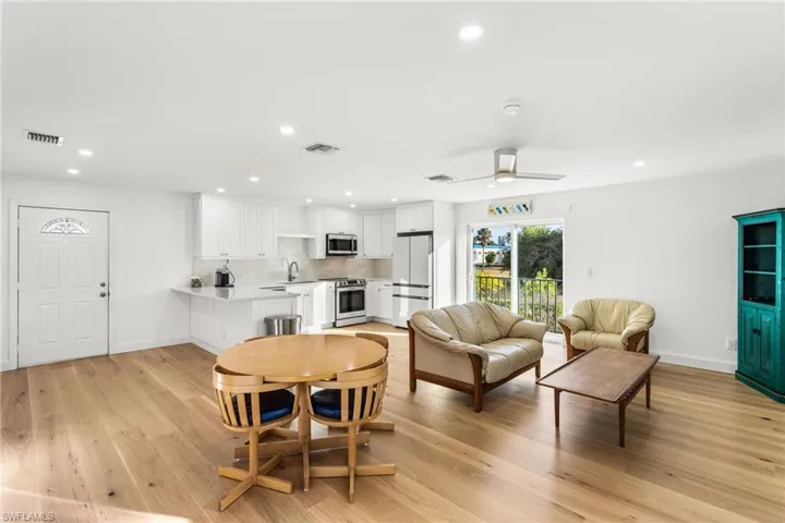 Dining area featuring recessed lighting, a ceiling fan, and light wood-style floors