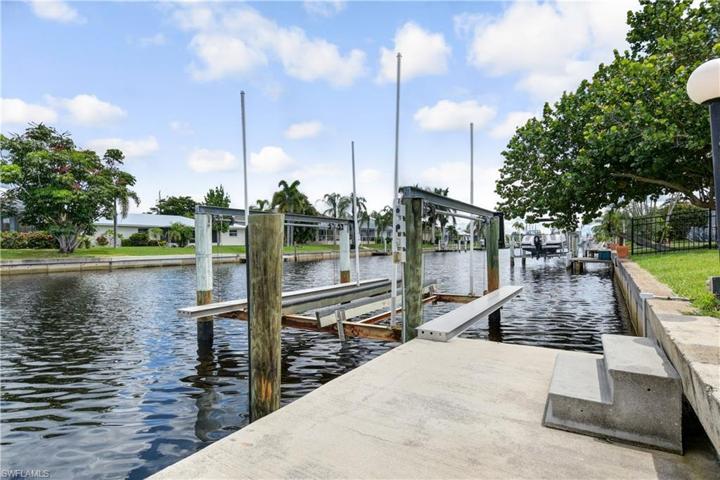 boat dock, seawall, and boat lift