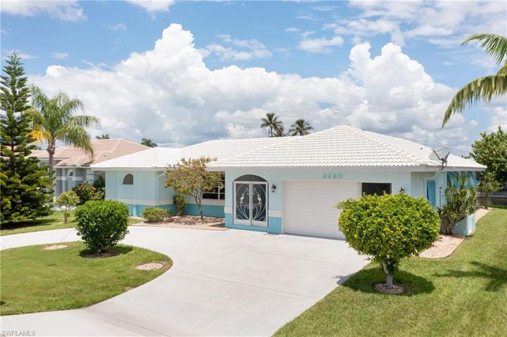 Recently painted exterior, screened entrance, plenty of room for parking