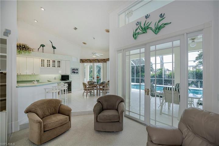 eat in kitchen area looking out to lanai from family room
