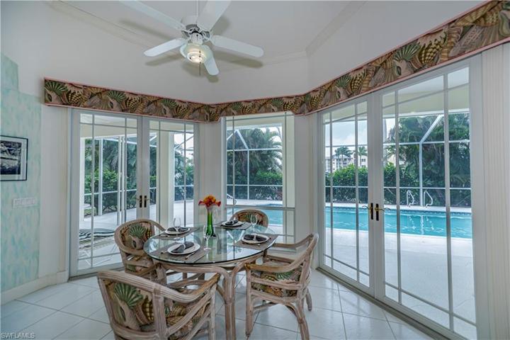 eat in kitchen area looking out to the pool and lanai
