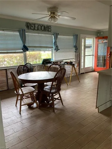 Sunroom with ceiling fan