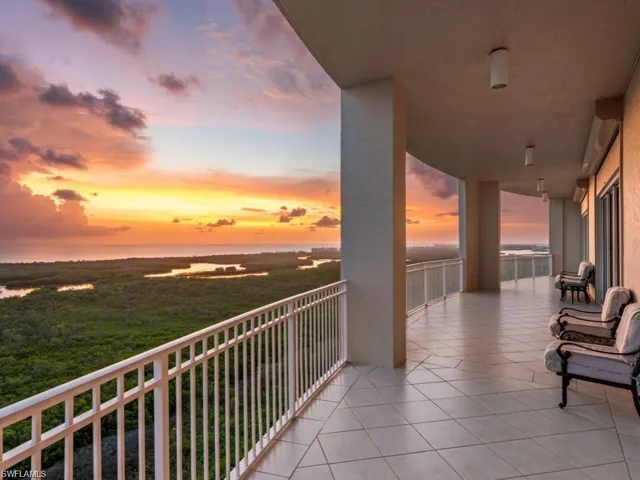 17th Floor Balcony at dusk with a water view