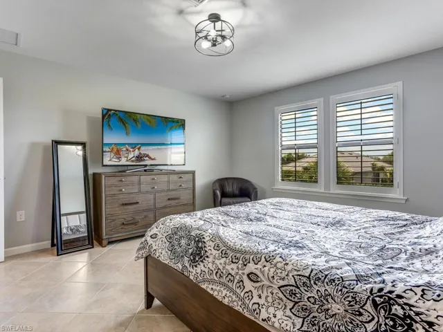 Bedroom featuring light tile patterned floors