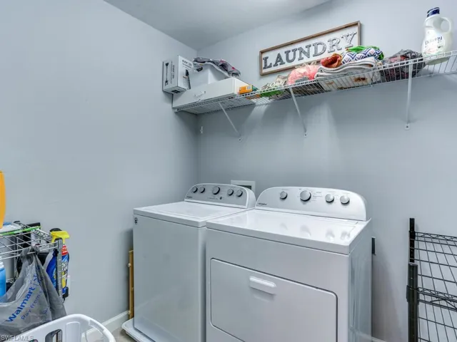 Laundry area with separate washer and dryer