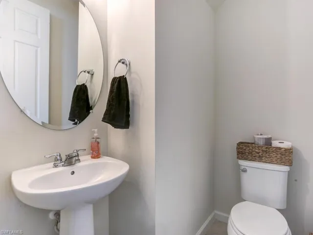 Bathroom with sink and toilet