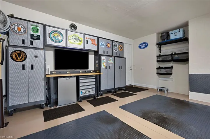 Garage w/ cabinetry and built ins