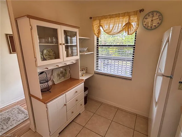 A large window in the Kitchen brings in natural light
