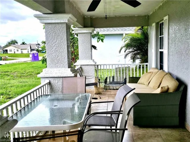 View of terrace featuring ceiling fan