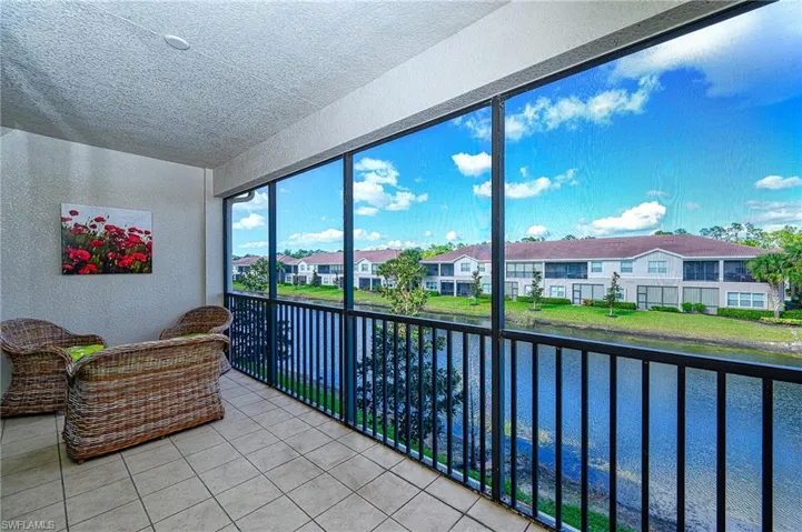 Screened and tiled lanai with lake view