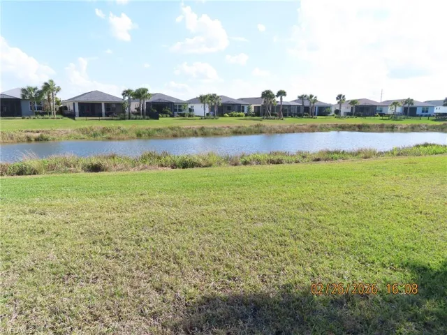 Water view featuring nearby suburban area