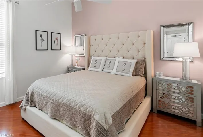 Bedroom featuring hardwood / wood-style flooring and ceiling fan