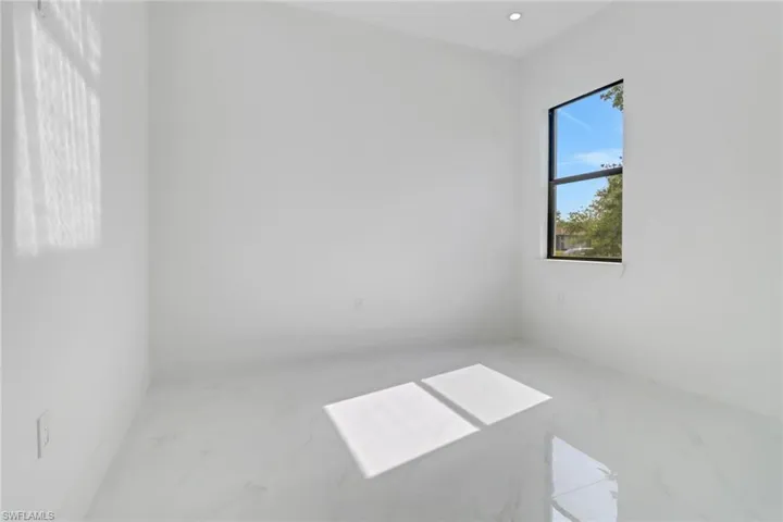 Spare room featuring recessed lighting