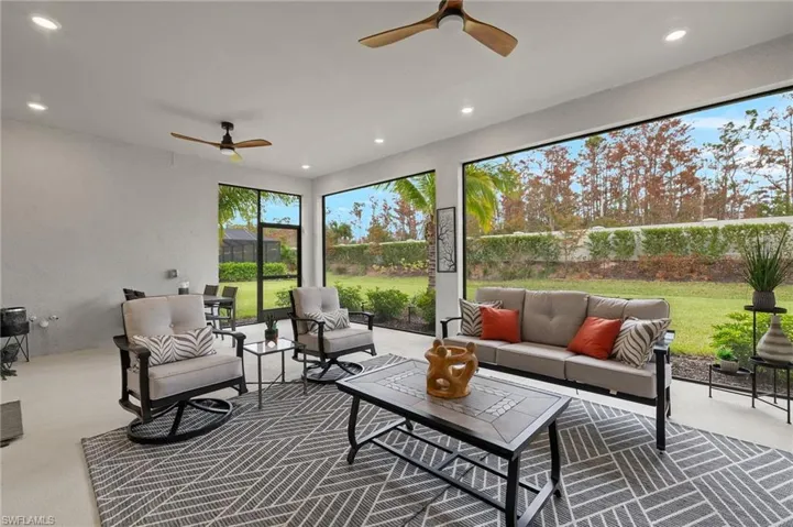 Screened extended lanai with ceiling fans. Pre plumbed and wired for outdoor kitchen and TV.  Pre wired for a pool.