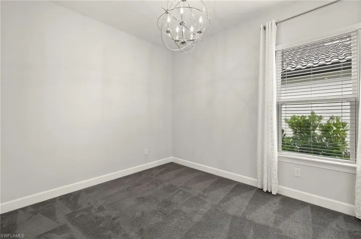 Bedroom #3 with chandelier lighting