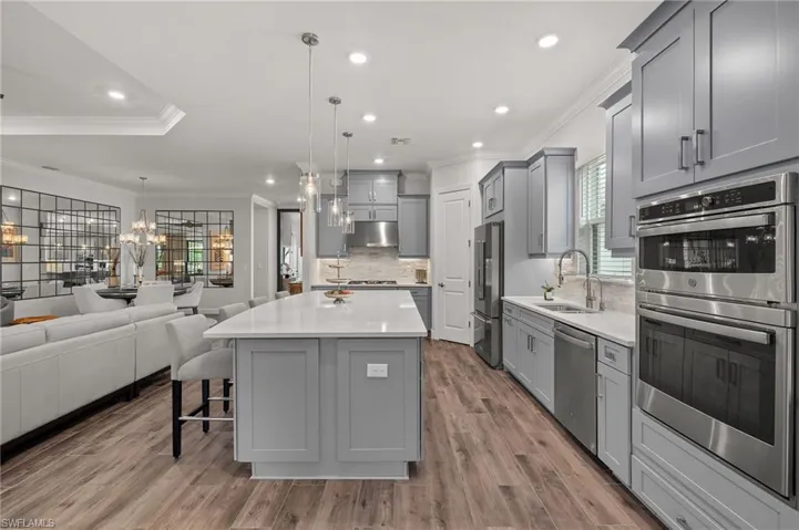 Kitchen with pendant lighting, stainless steel appliances
