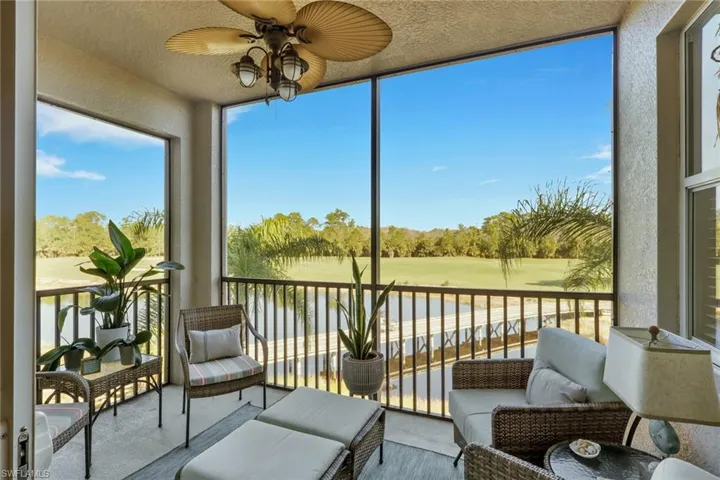 Screened lanai featuring expansive view of golf course, water and natural preserves