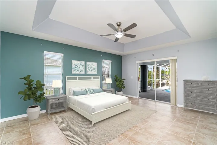 Virtually Staged. Access to exterior, light tile patterned flooring