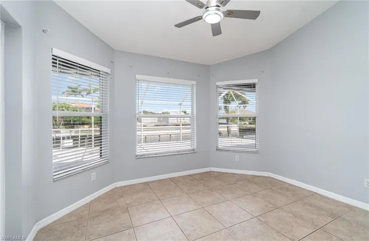 Breakfast Nook area overlooking the pool deck and canal.