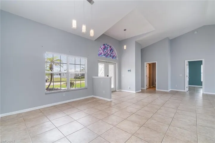 Open Foyer with vaulted ceilings, main dining area