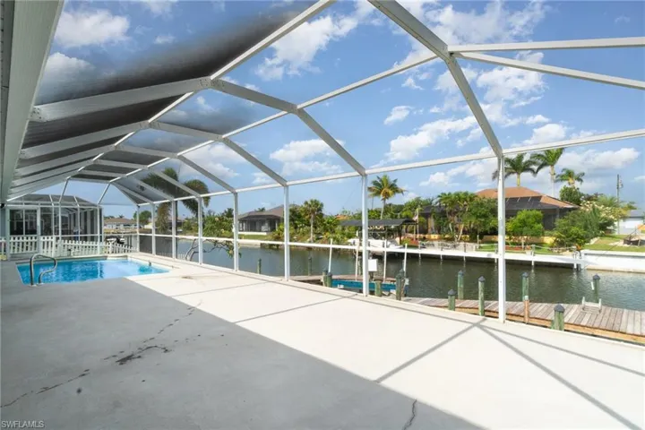 Sun deck area of lanai.  Boat docks pictured.