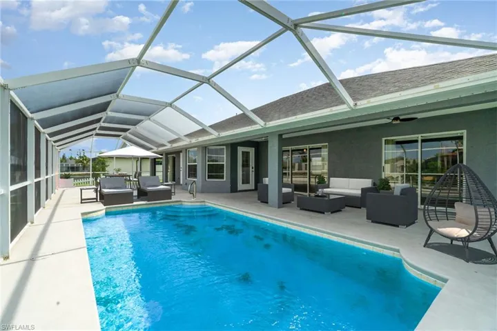 Virtually Staged.  Wonderful outdoor living space. Large under truss area plus sun deck