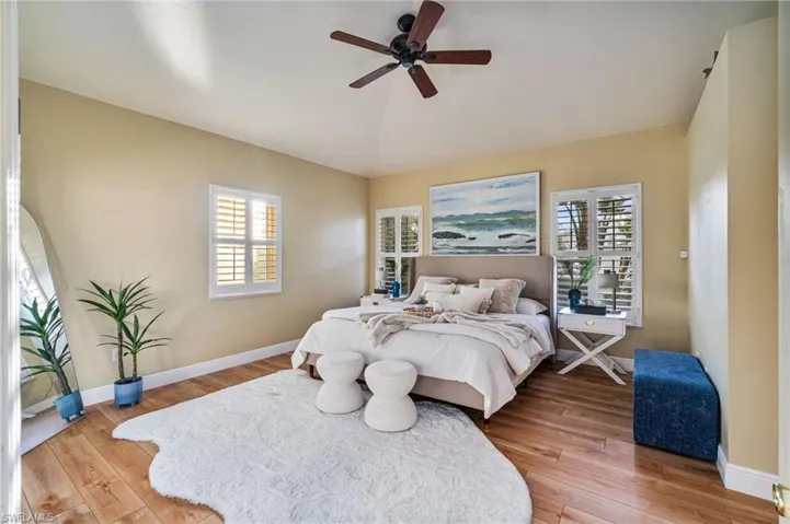Comfortable primary bedroom with calming natural light.