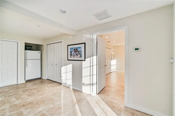 First level extensive bonus areas are broken into four parts. Entry has refrigerator, storage and steps to second level. Room to add an elevator.