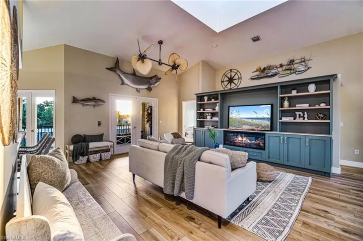 Spacious living area with open layout with an abundance of natural light