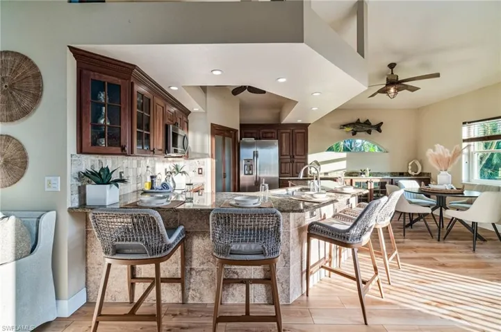 Open kitchen with island seating for casual dining