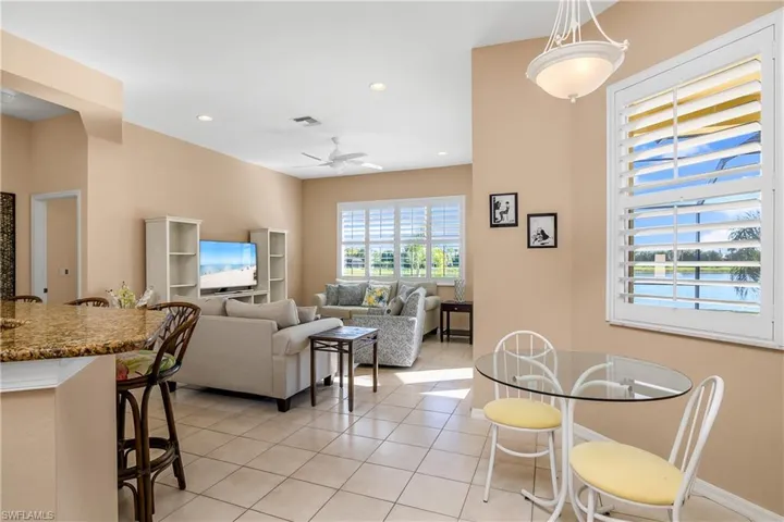 Tiled living room with ceiling fan
