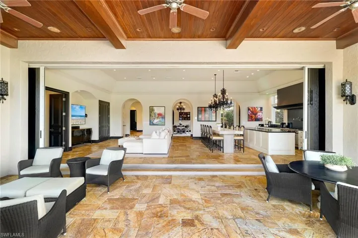 View of patio / terrace featuring a ceiling fan, outdoor dining area, and outdoor lounge area